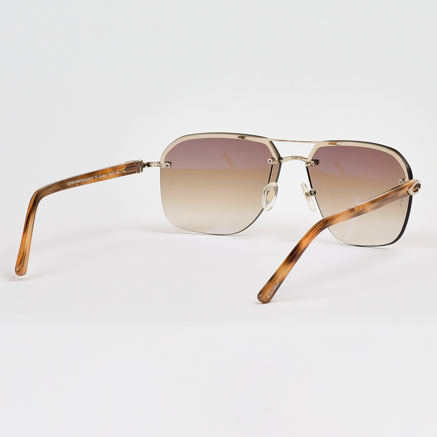 Luxurious Design with Gradient Lenses and a Distinctive "C" Detail.