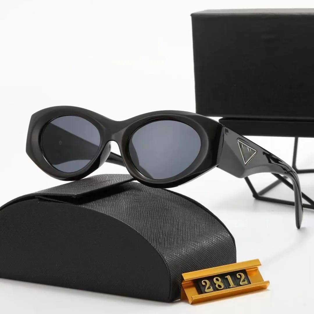 Women's Symbol Sunglasses featuring a Bold, Black Oval Frame.