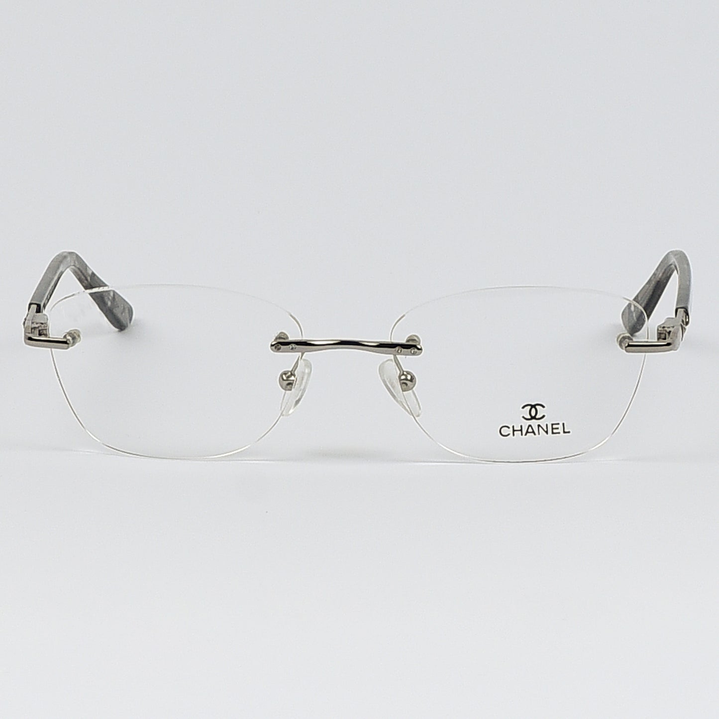 Rectangular Cat Eye Glasses with a Rim less frame and patterned Temples For Women