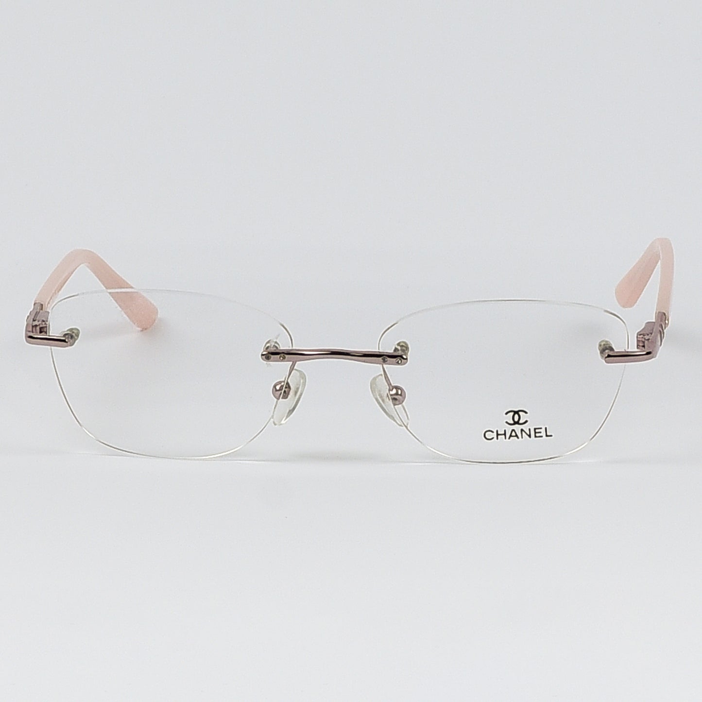 Rectangular Cat Eye Glasses with a Rim less frame and patterned Temples For Women