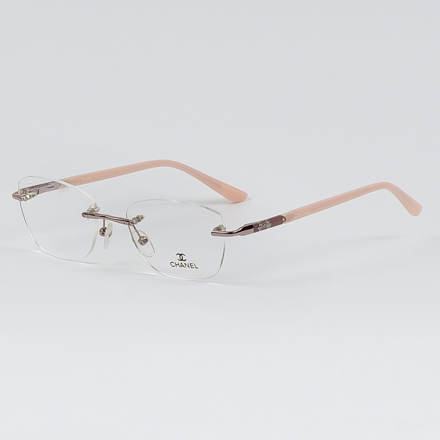 Rectangular Cat Eye Glasses with a Rim less frame and patterned Temples For Women