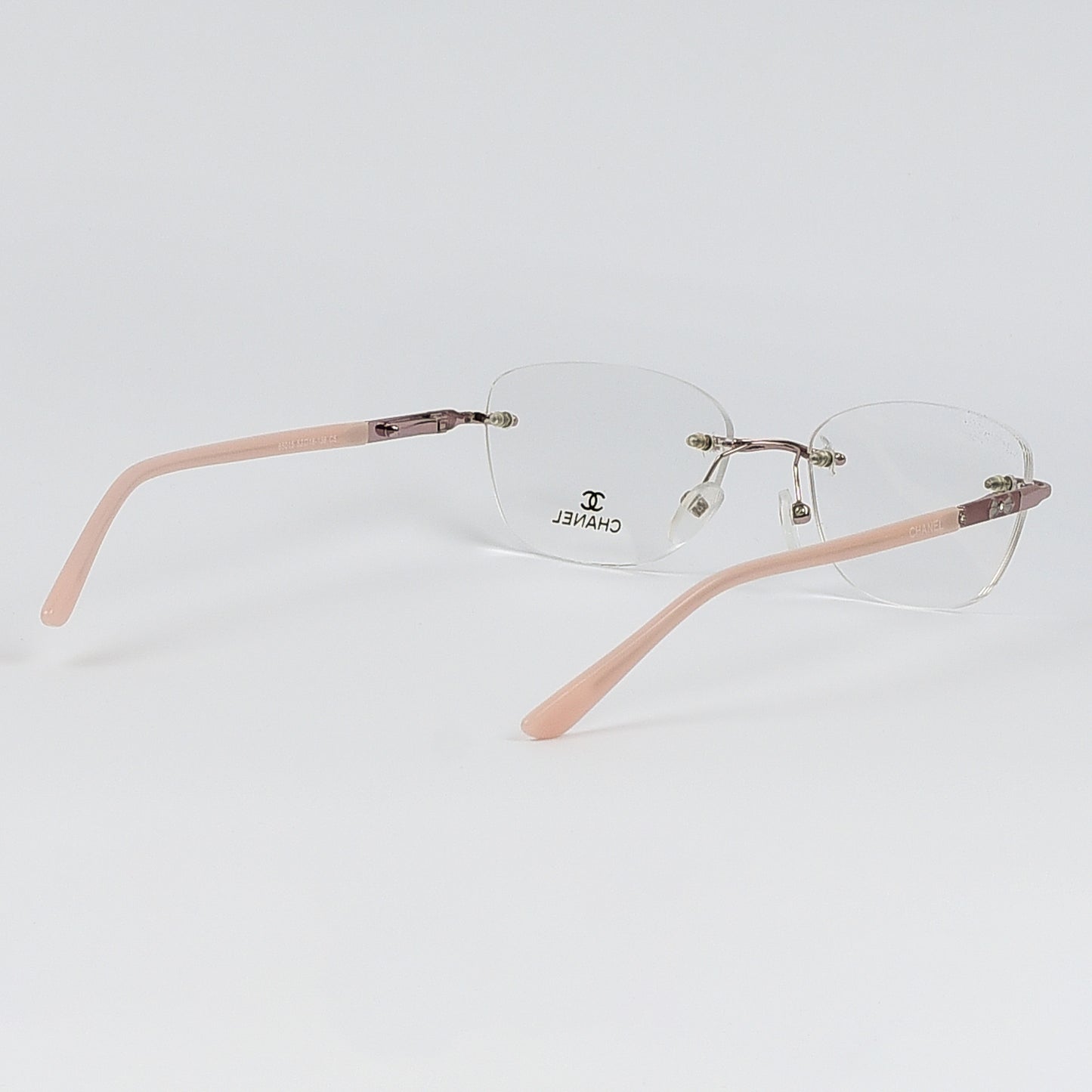 Rectangular Cat Eye Glasses with a Rim less frame and patterned Temples For Women