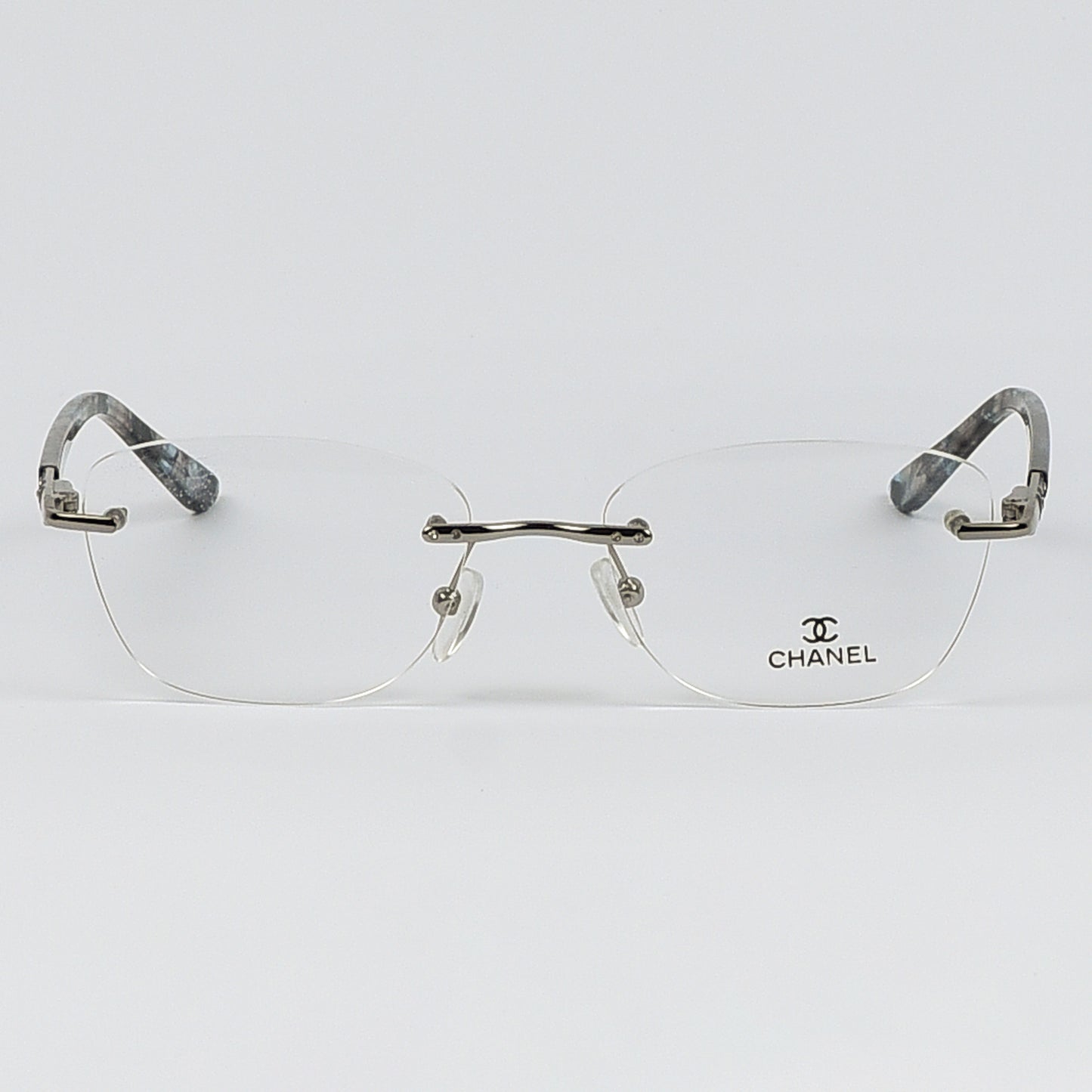 Rectangular Cat Eye Glasses with a Rim less frame and patterned Temples For Women