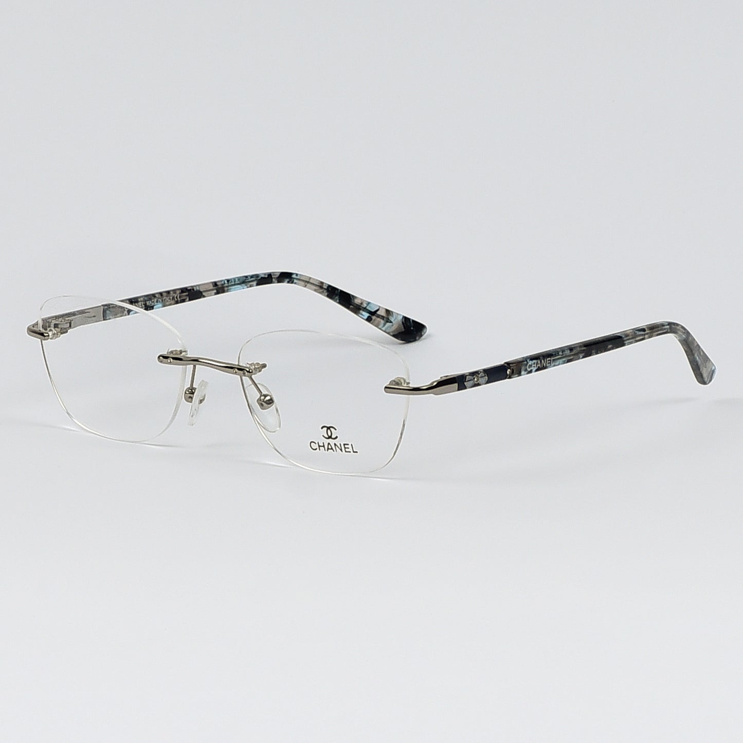 Rectangular Cat Eye Glasses with a Rim less frame and patterned Temples For Women