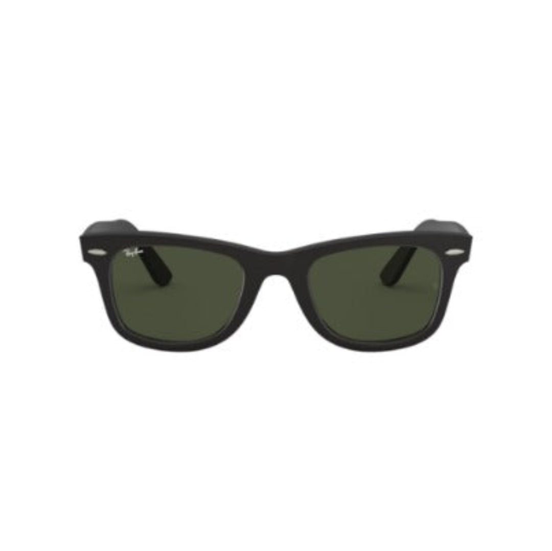 Black sunglasses with green lenses on a white background