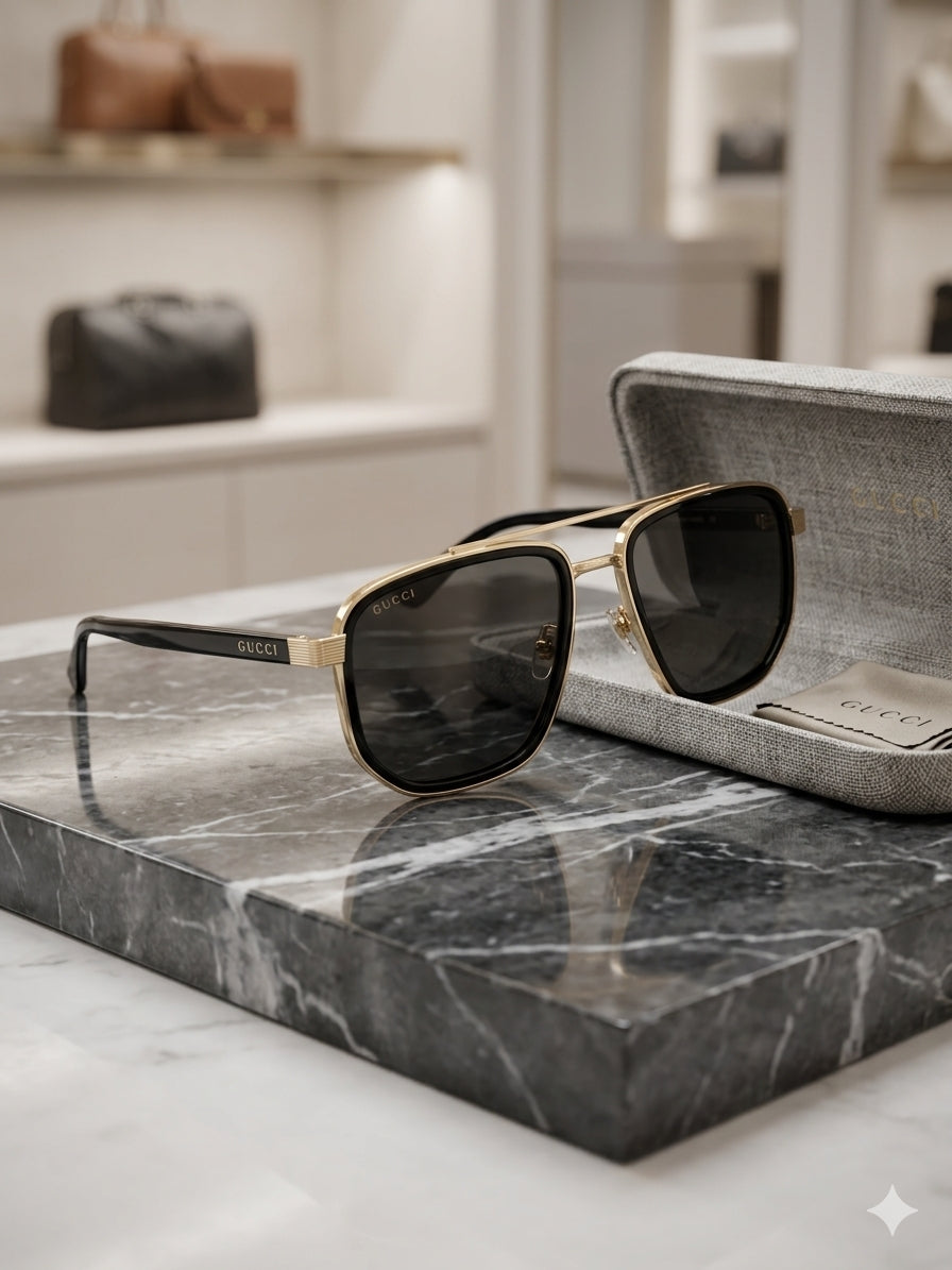 GG2073S Navigator sunglasses featuring a polished Gold-Tone and Black Geometric frame